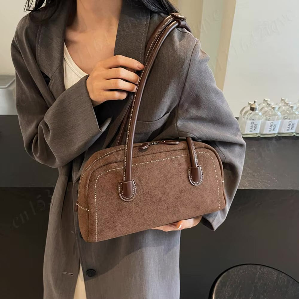 Women's suede shoulder bag with pockets